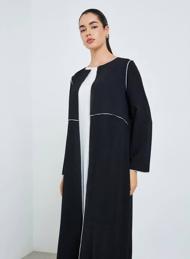 ستايلي عباية نسائية بحواف متباينة